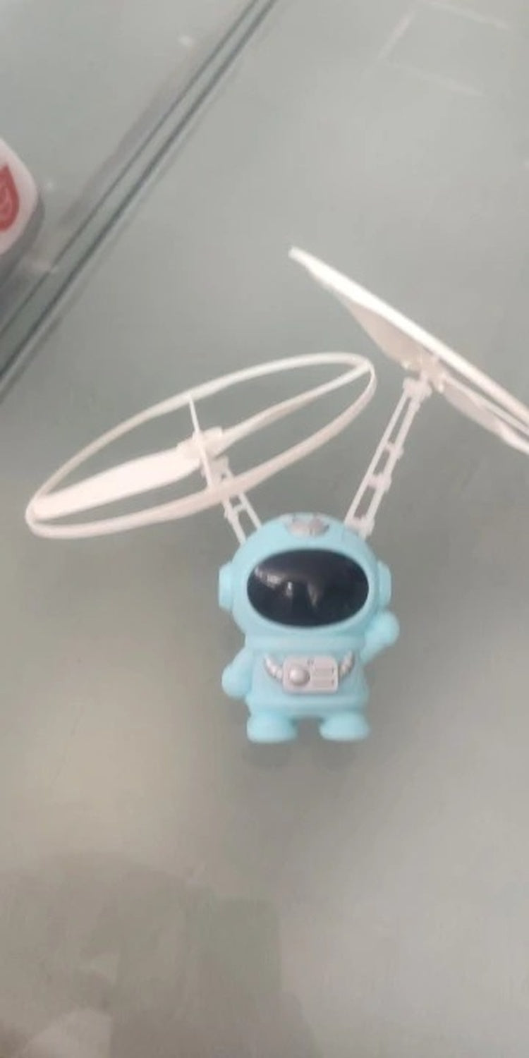 Interactive Flying Mini Astronaut Drone – Hand-Controlled Robot Toy with Lights, Perfect Outdoor Fun Gift for Kids