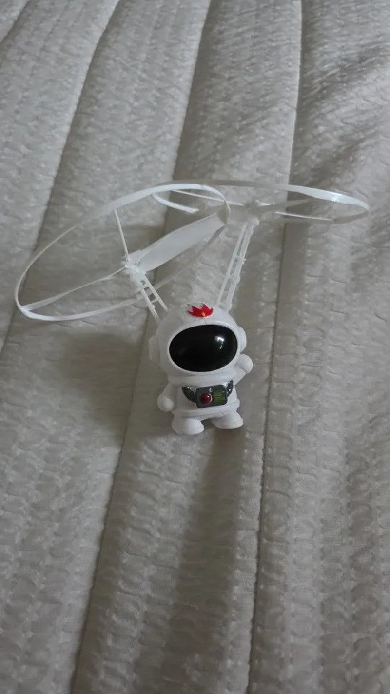 Interactive Flying Mini Astronaut Drone – Hand-Controlled Robot Toy with Lights, Perfect Outdoor Fun Gift for Kids