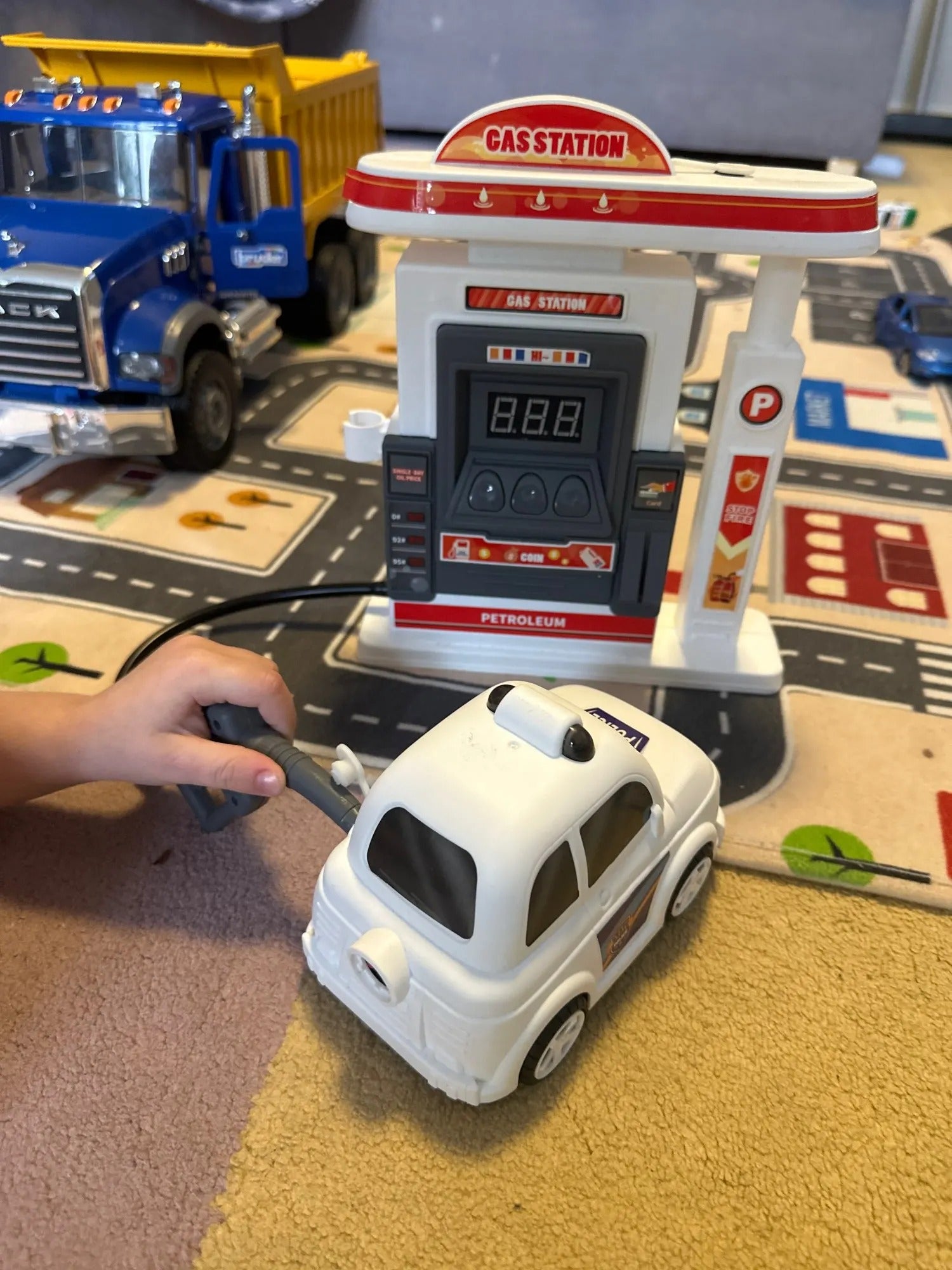 Interactive Gas Station Toy Set with Water Spray Pump, Light & Music Police Car, Safe for Kids Ages 3+