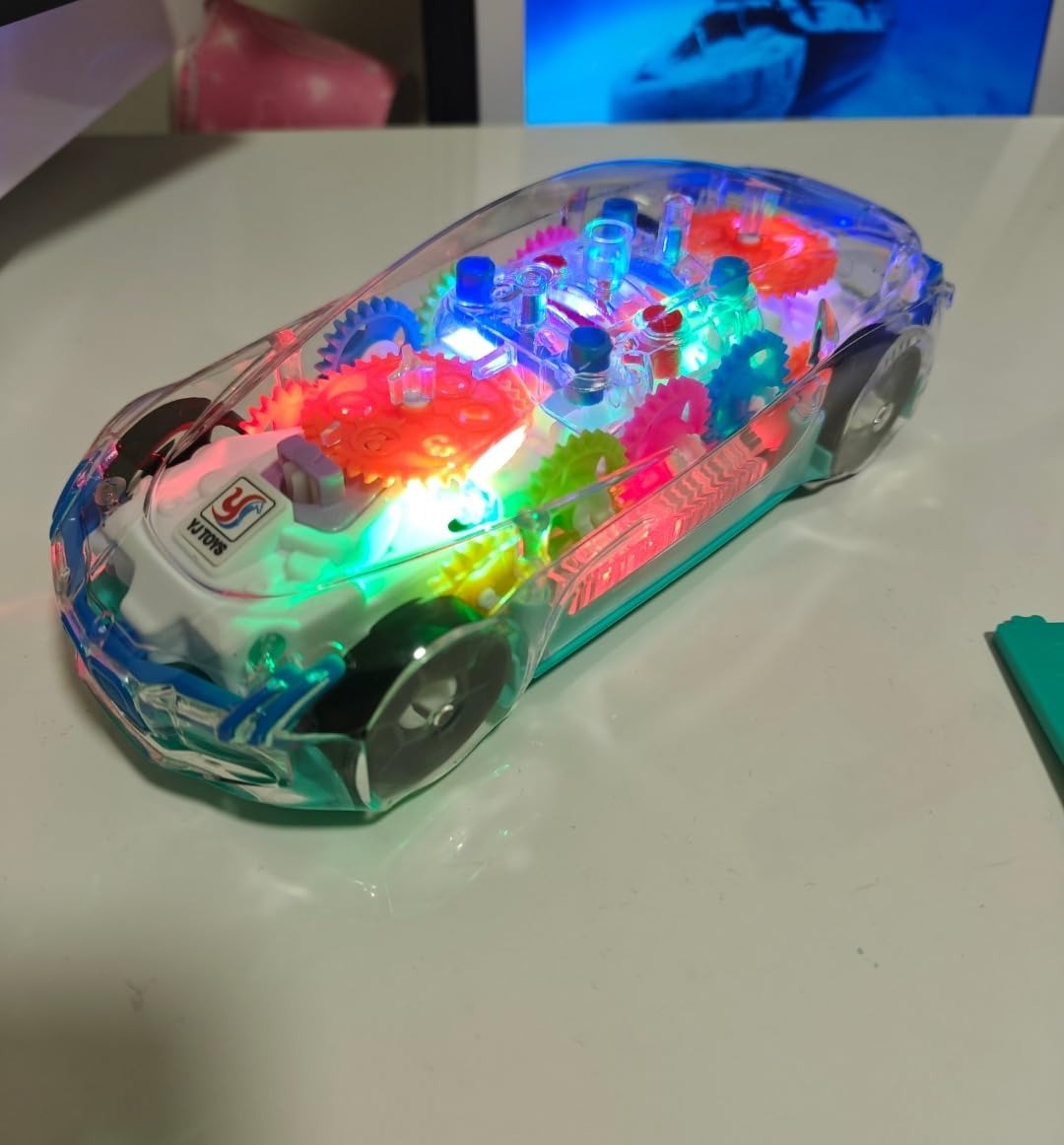 Light-Up Transparent Car with Moving Gears, Music & Durable Plastic, Suitable for Kids 6 Months+