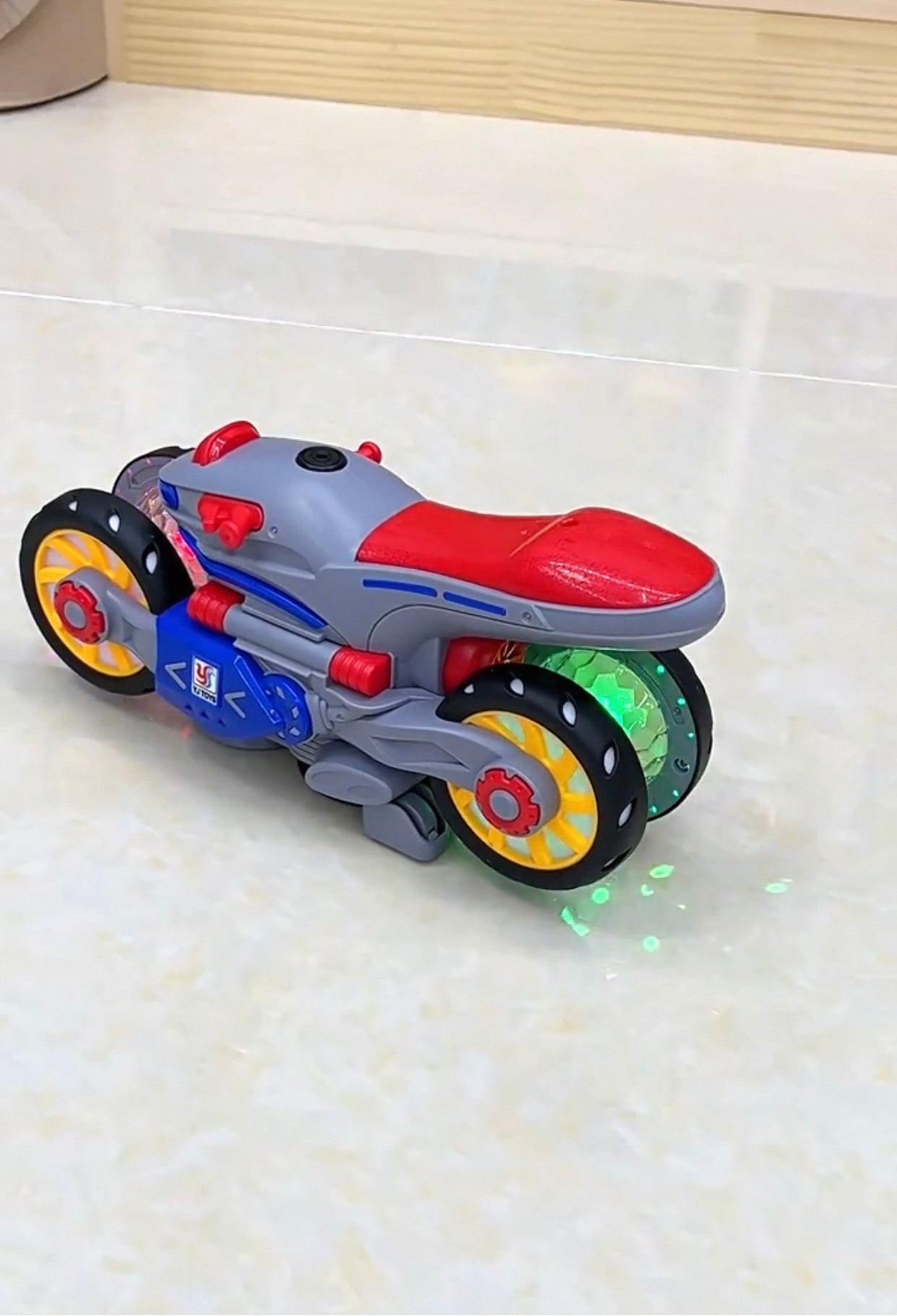 Music Distortion Motorcycle with 4-wheel spinning mode, 360° rotation, and safe for kids ages 3+