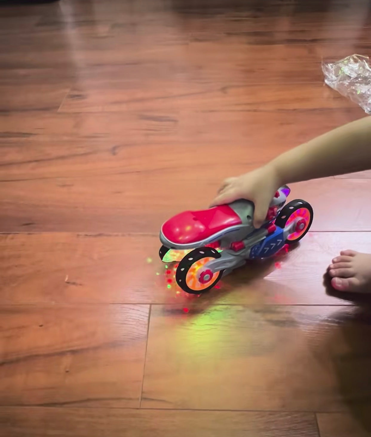 Music Distortion Motorcycle with 4-wheel spinning mode, 360° rotation, and safe for kids ages 3+