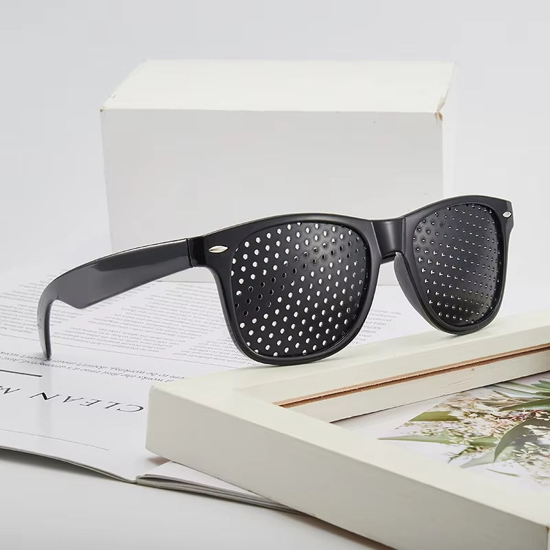 Pinhole Glasses for Vision Correction and Eye Relaxation