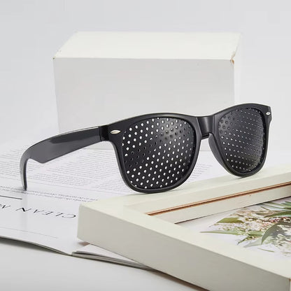 Pinhole Glasses for Vision Correction and Eye Relaxation