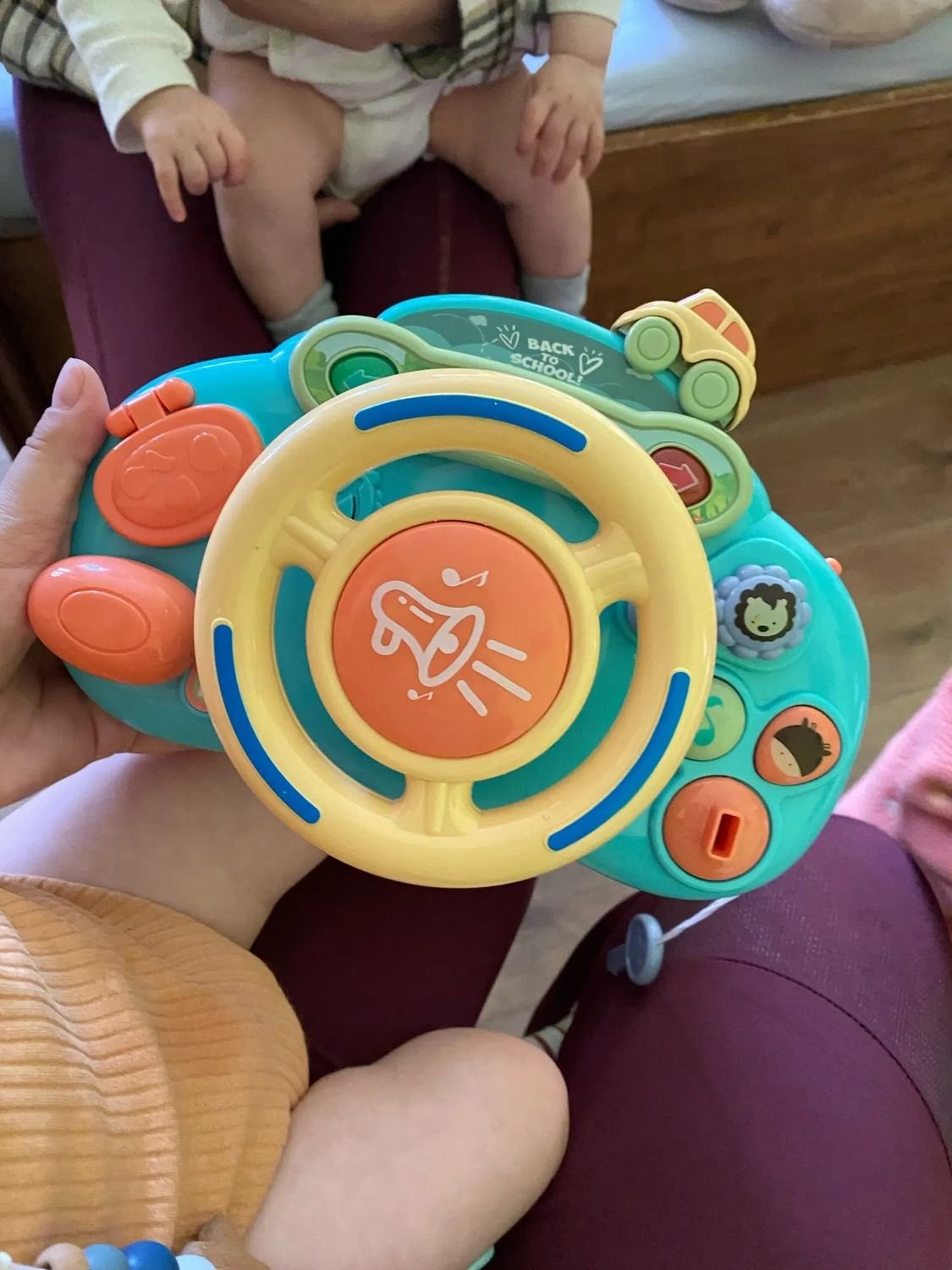 Steering Wheel Toy with Sound, Lights, and Secure Strap – Safe for Ages 18+ Months