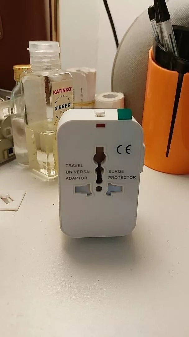 Universal Travel Adapter with USB Ports, Overload Protection, Multistandard Socket Outlet